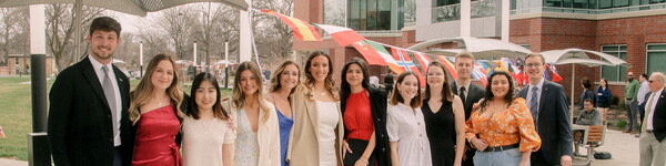 A group of international students at their graduation.
